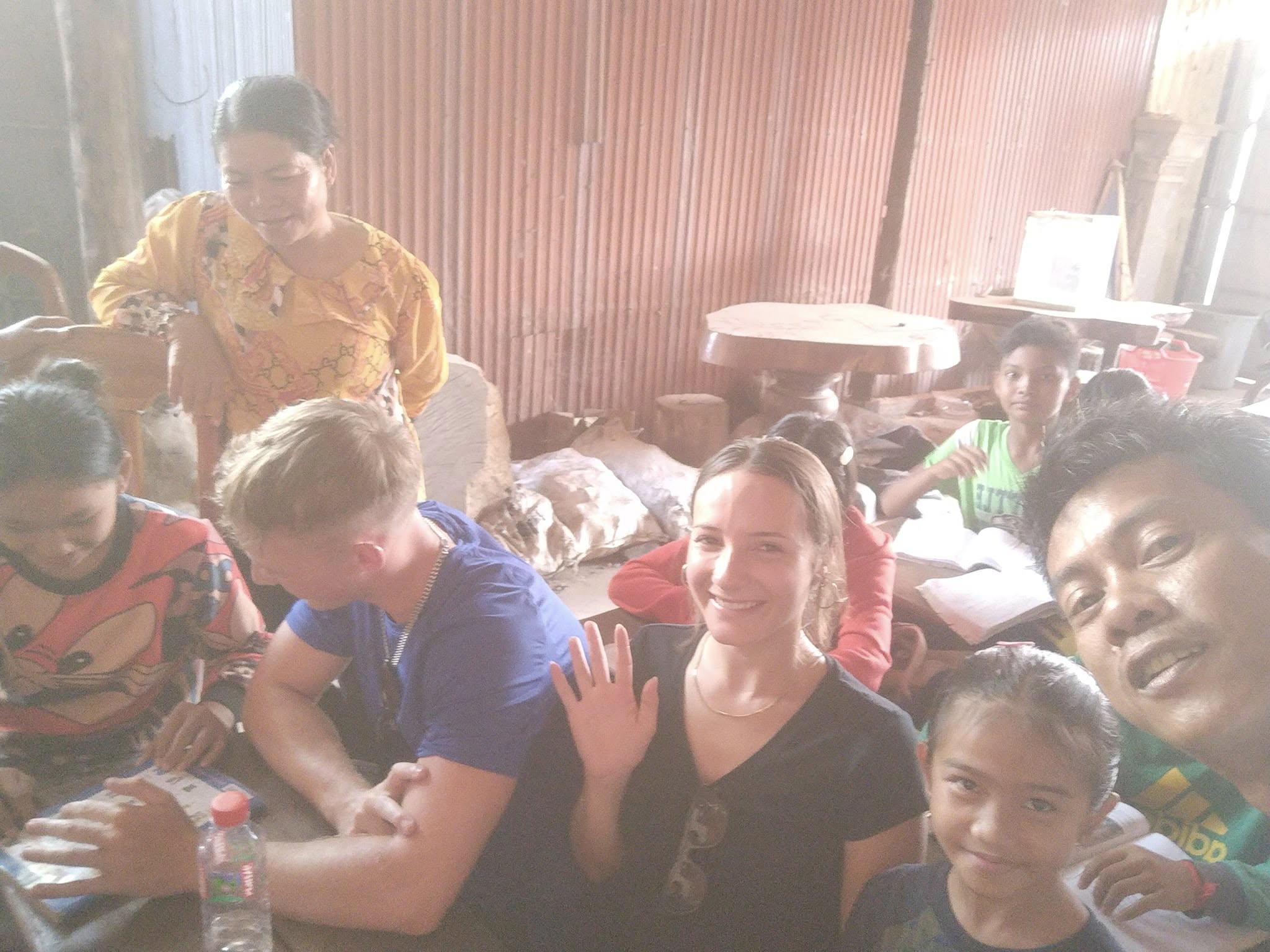 European volunteer with children